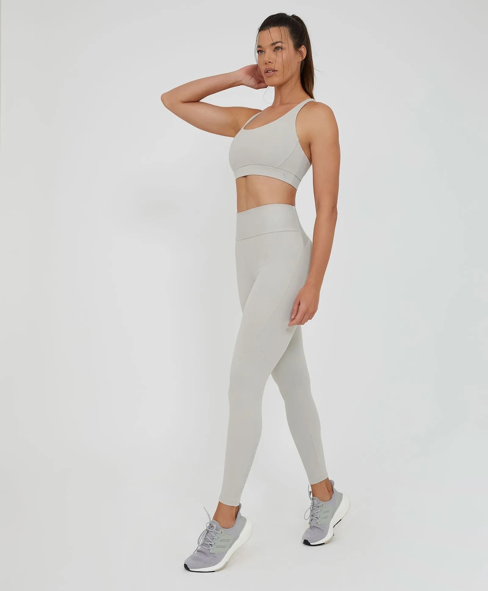 Legging Com Bolso e Recortes Cinza Alto Giro